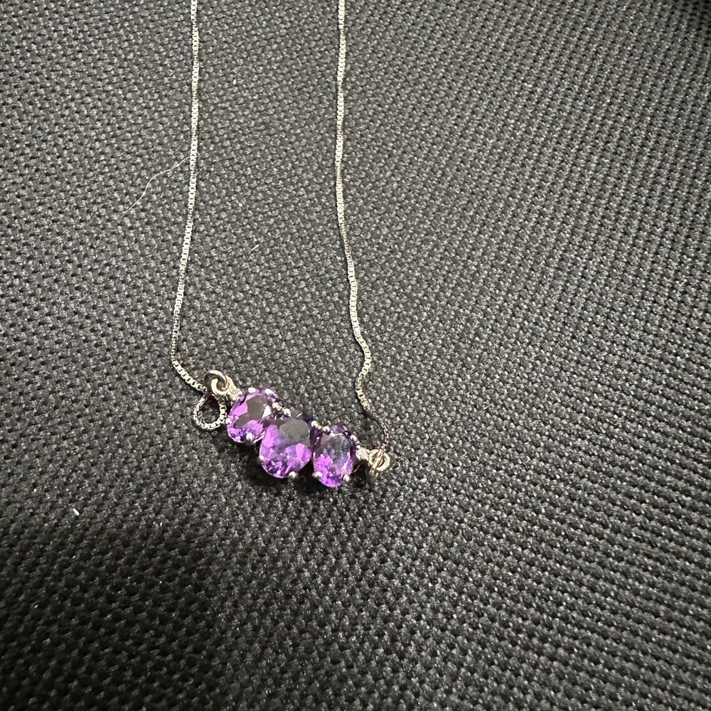 Beautiful sterling silver necklace with purple stones